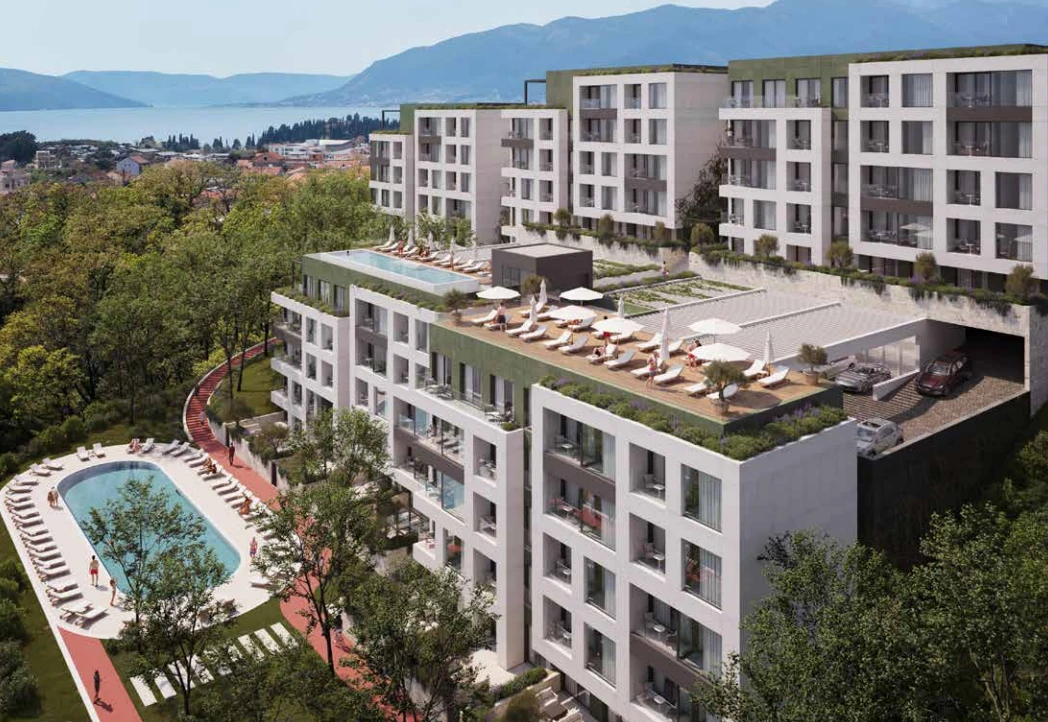 Novi stambeni kompleks u Tivtu sa uređenim zelenim površinama, bazenskim zonama, dječijim igralištem